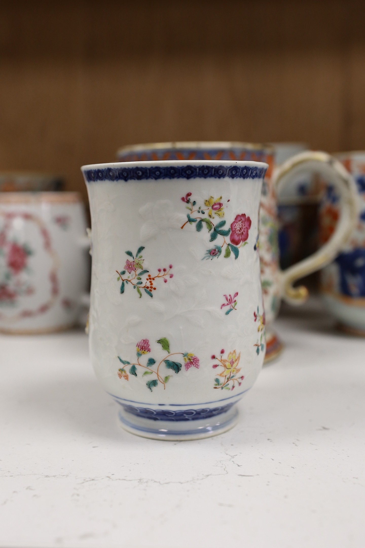 A large selection of 18th century Chinese export porcelain bowls, plates and mugs a/f